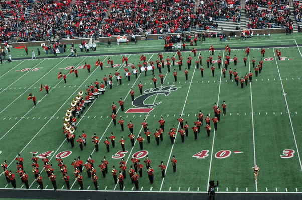 The University of Cincinnati Bearcat Band forms a C-Paw on the field at Nippert Stadium in 2008.