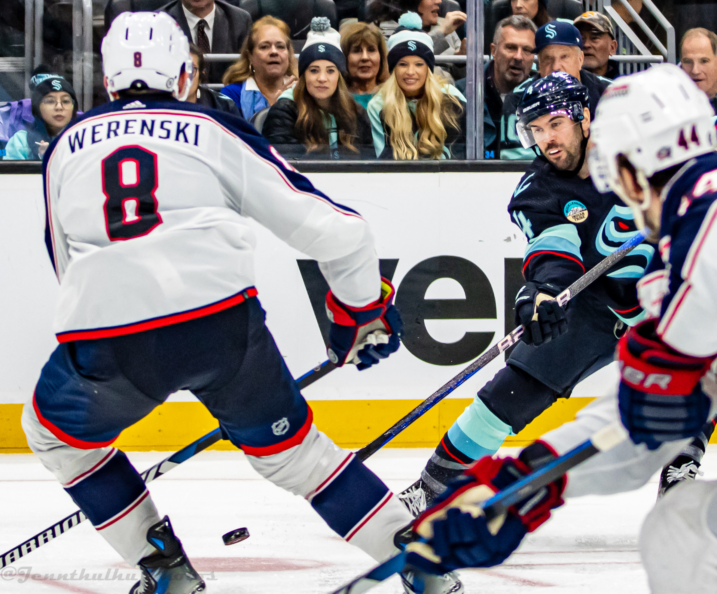 Columbus Blue Jackets defenseman Zach Werenski faces Seattle Kraken defenseman Justin Schultz during a 2024 game.