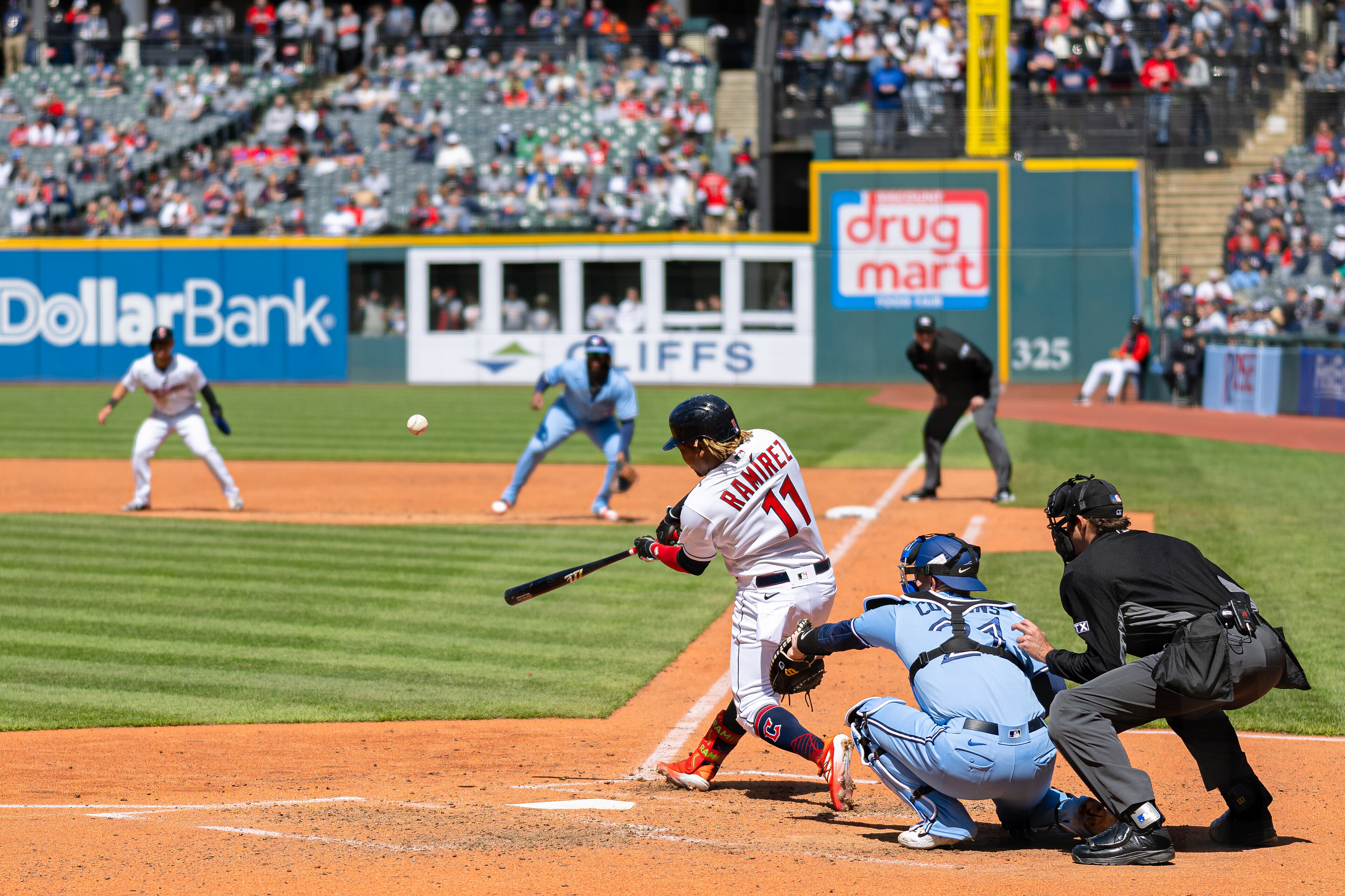 A wide game-action view of Jose Ramirez batting for the Cleveland Guardians in 2022.