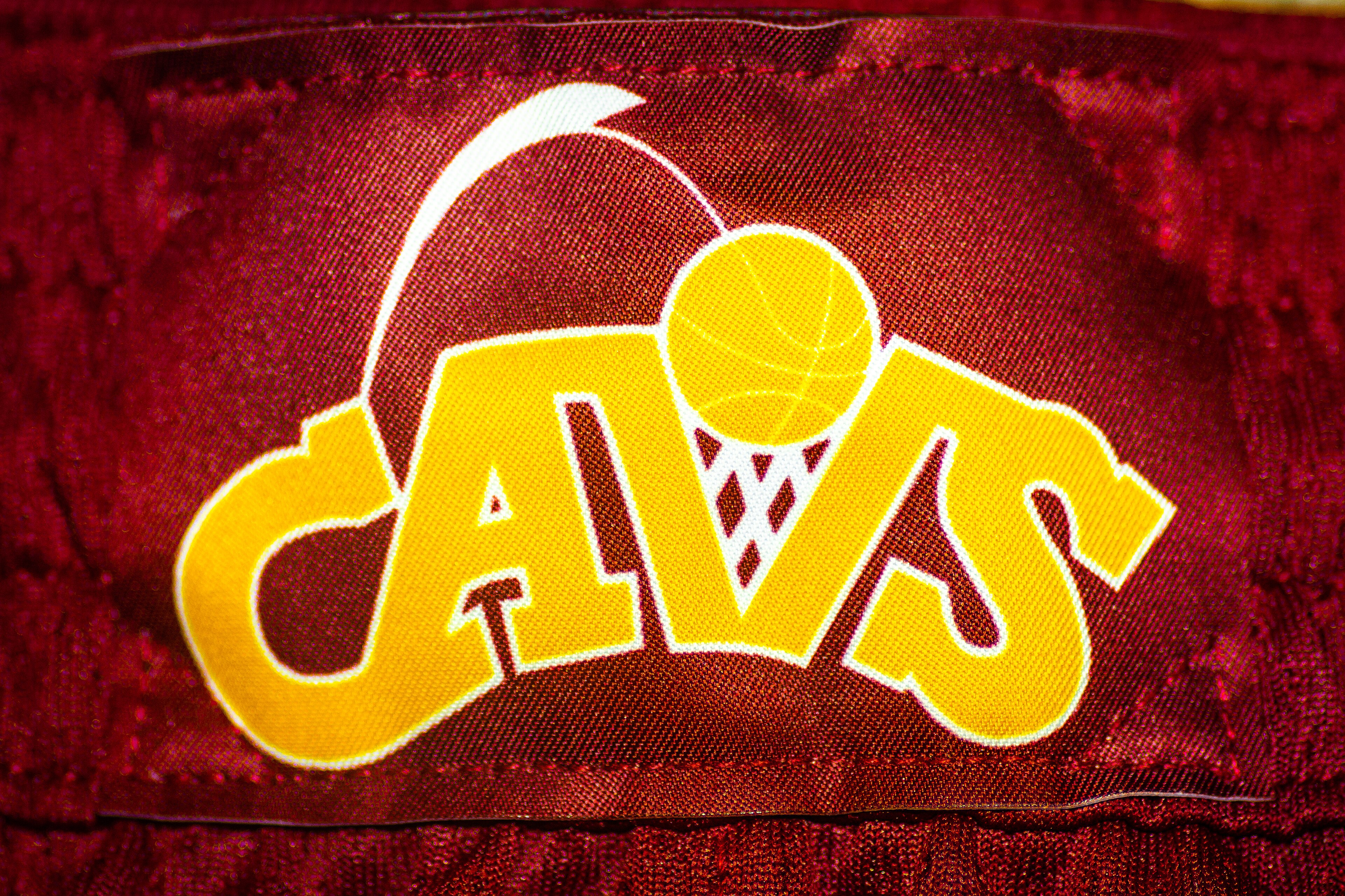 A close view of a Cleveland Cavaliers logo embroidered on red fabric in 2022.