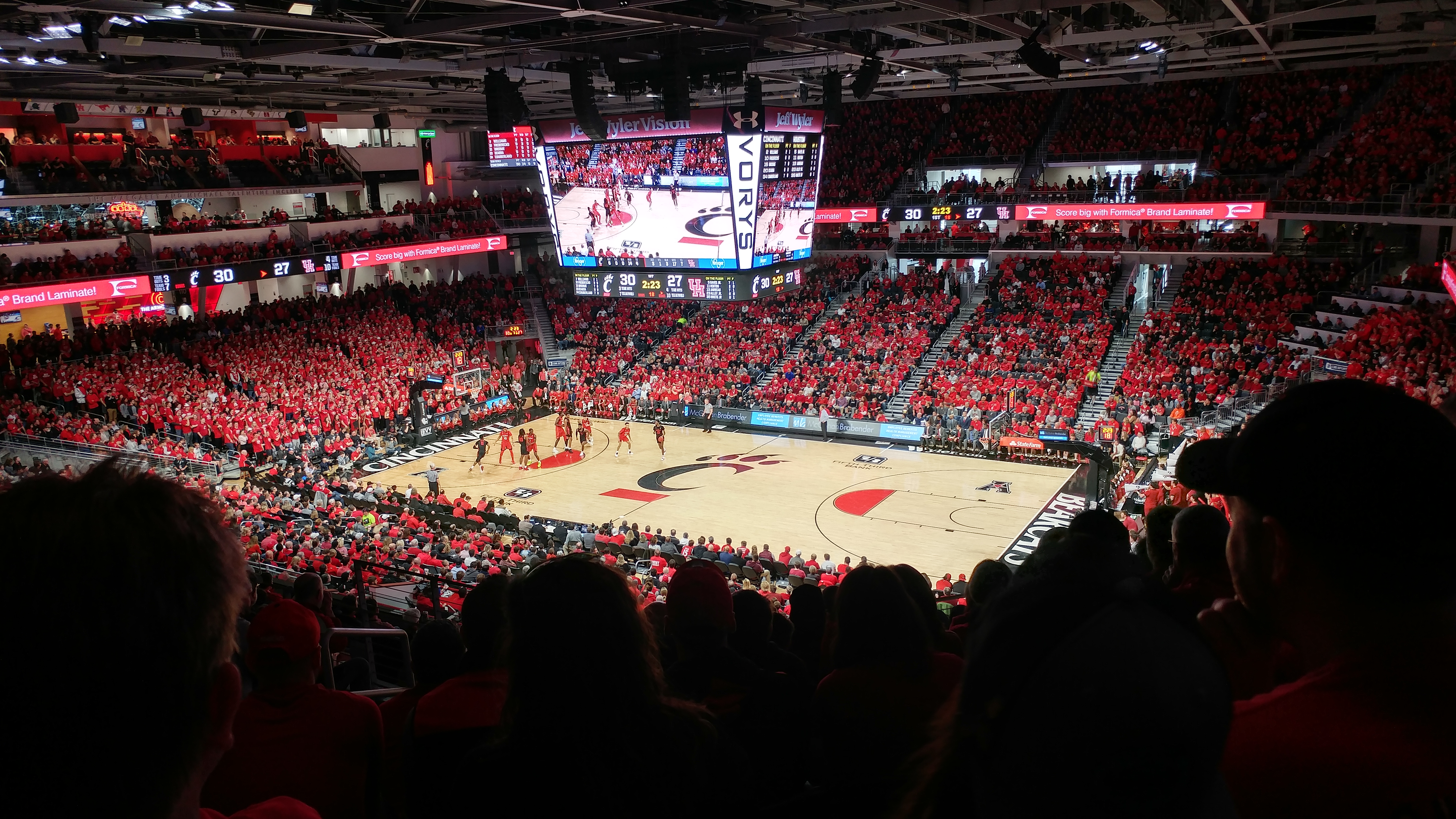 Wide view of a Cincinnati men's basketball game inside Fifth Third Arena.